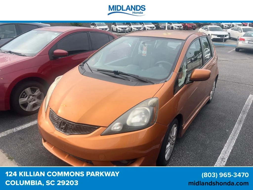 Used 2009 Orange Revolution Met Honda Sport image 1