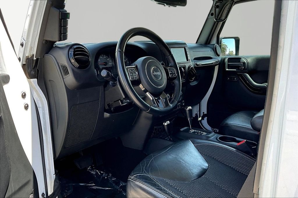 Used 2016 White Jeep Unlimited Sahara image 16