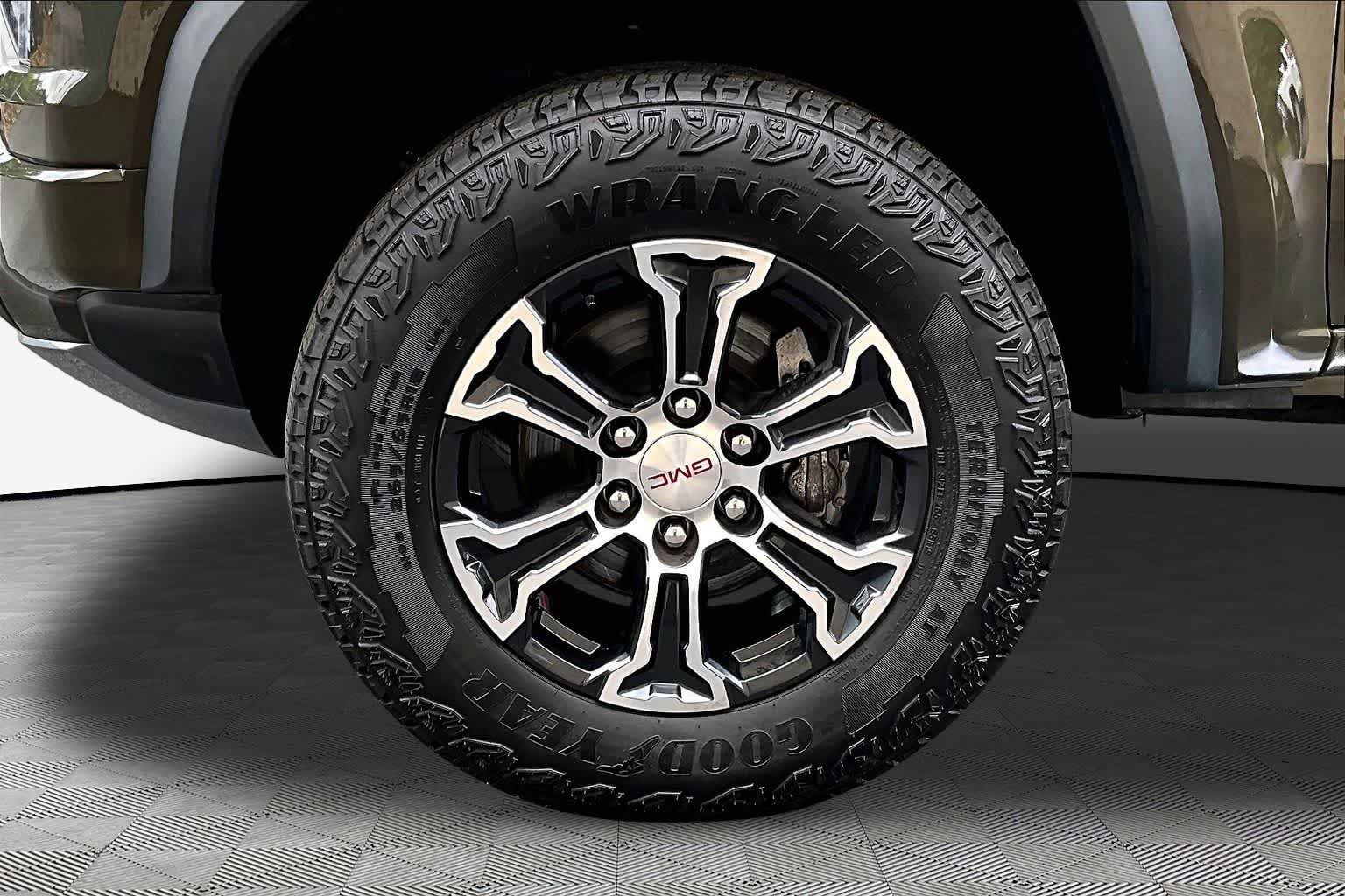 Used 2023 Deep Bronze Metallic GMC 4WD AT4 image 11