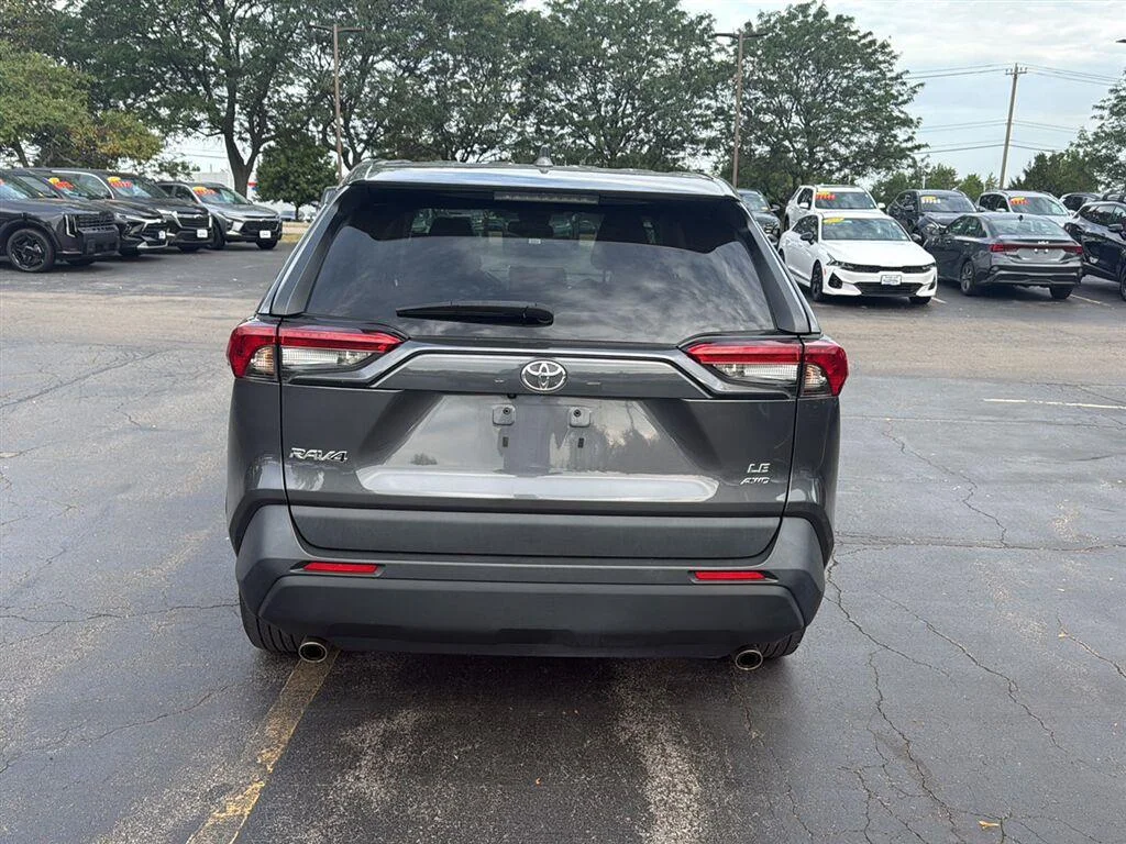 Used 2023 Magnetic Gray Metallic Toyota LE image 4