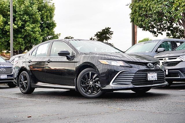 Used 2024 Black Toyota LE image 1