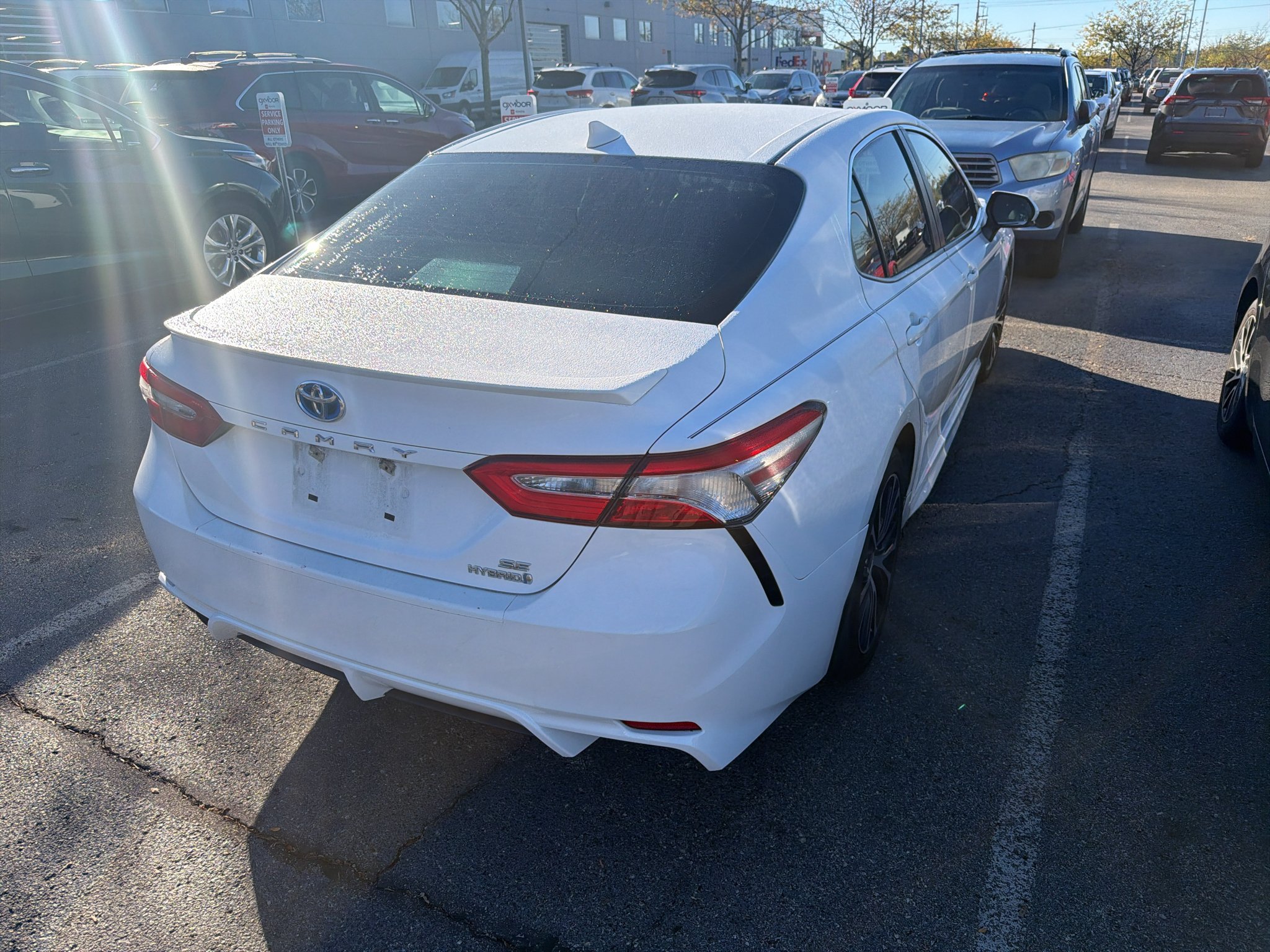 Used 2020 Super White Toyota Hybrid SE image 4