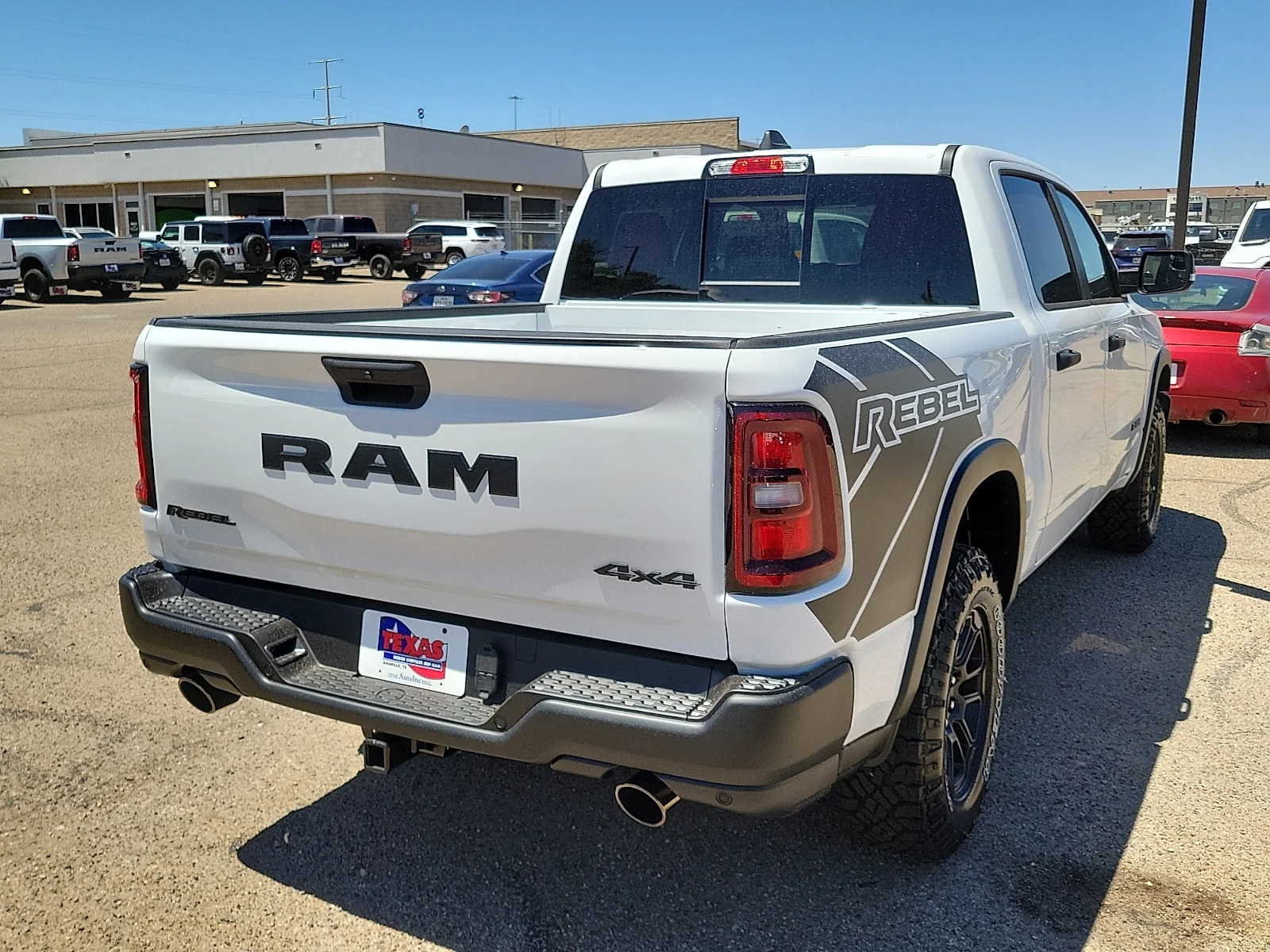 New 2026 PW7 Bright Whit Ram REBEL CREW CAB 4X4 5