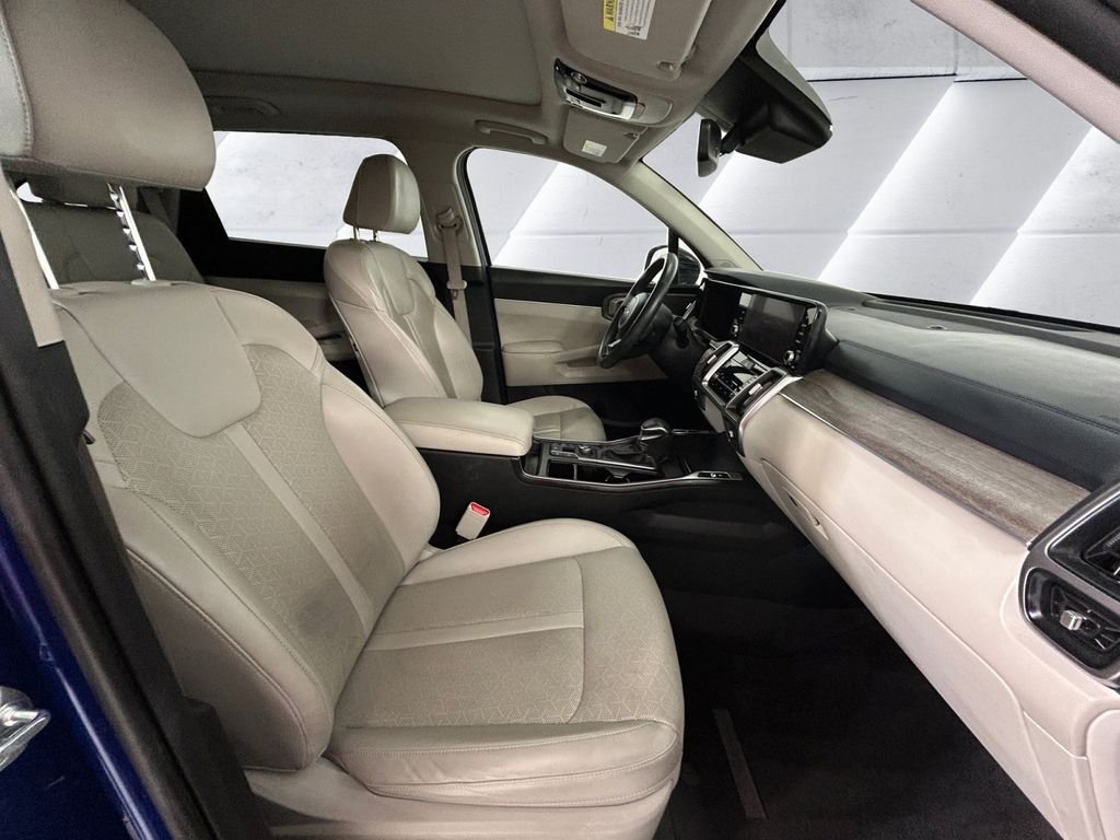 Used 2023 Blue Kia EX image 13