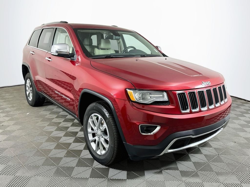 Used 2015 Deep Cherry Red Crystal Jeep Limited image 3