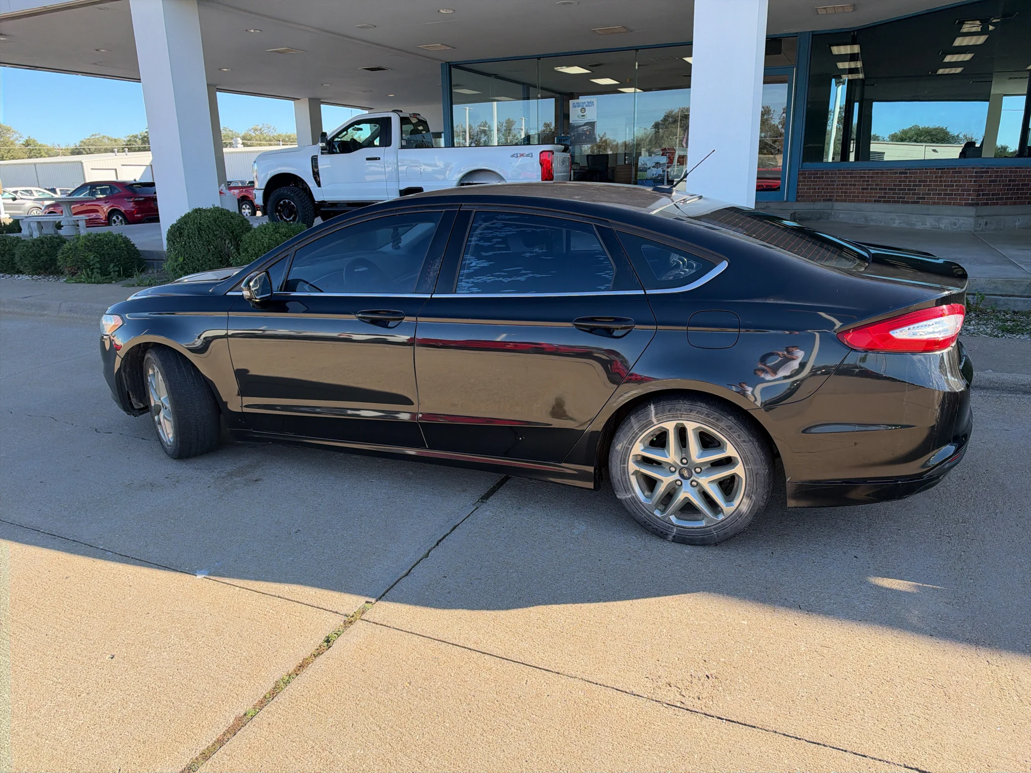 Used 2015 Ruby Red Tinted Clearcoat Ford SE image 9