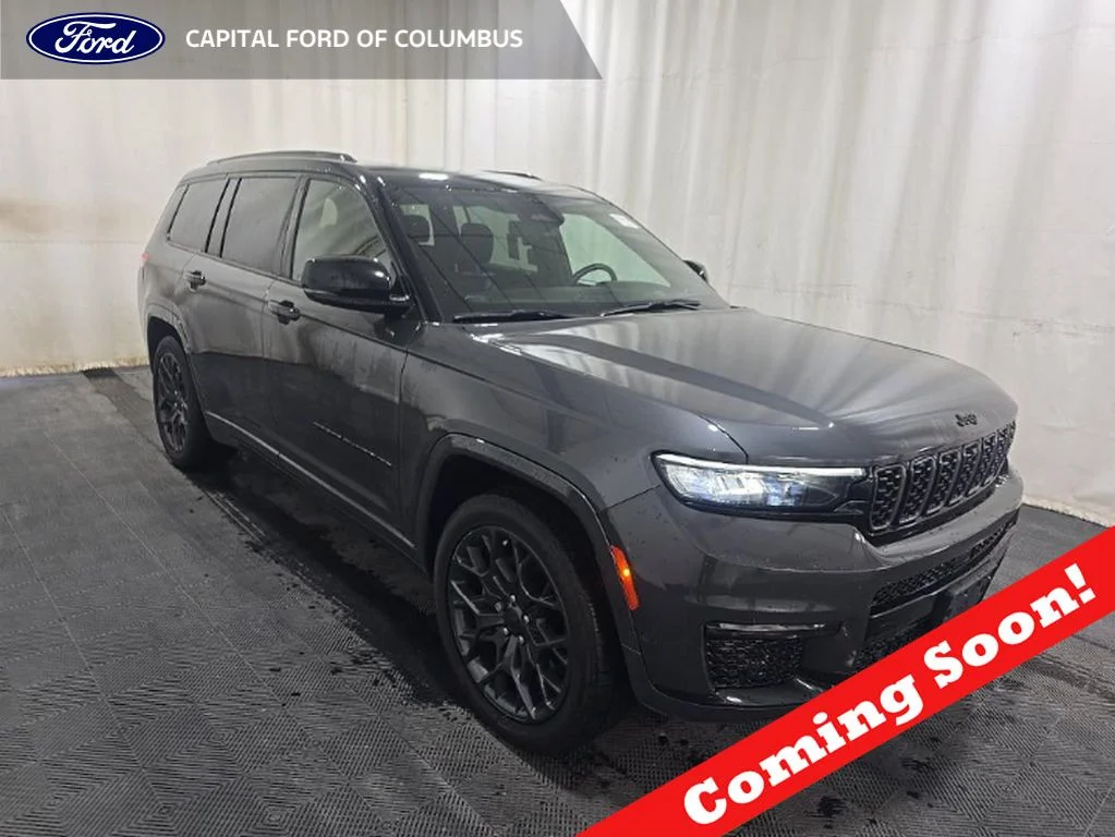 Used 2023 Metallic Jeep Summit image 1