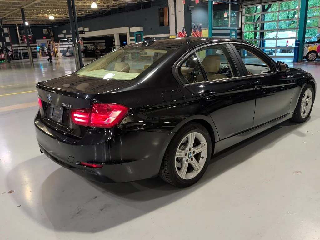 Used 2014 Black BMW 320i xDrive image 9