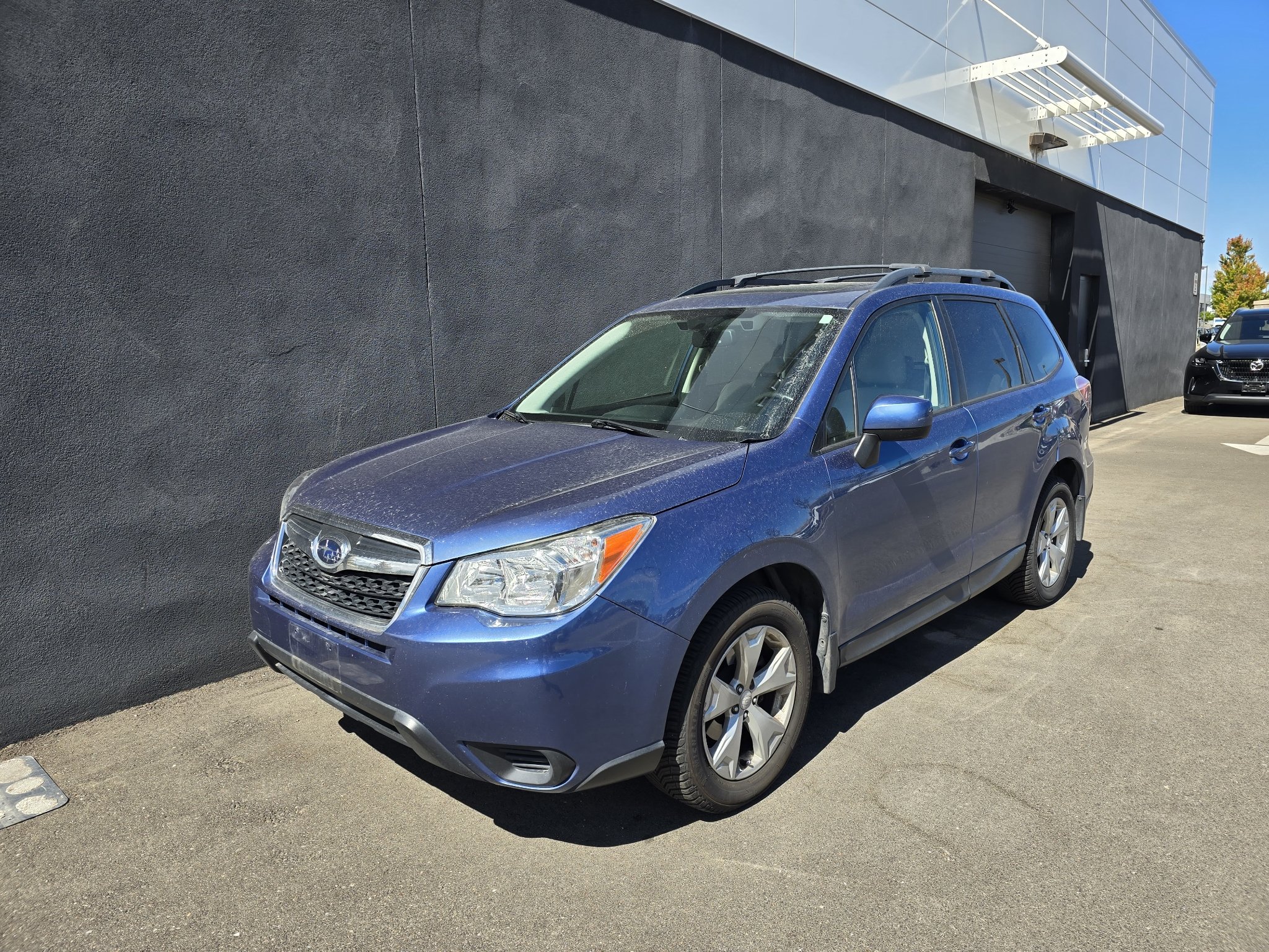 Used 2015 Quartz Blue Pearl Subaru 2.5i Premium image 1