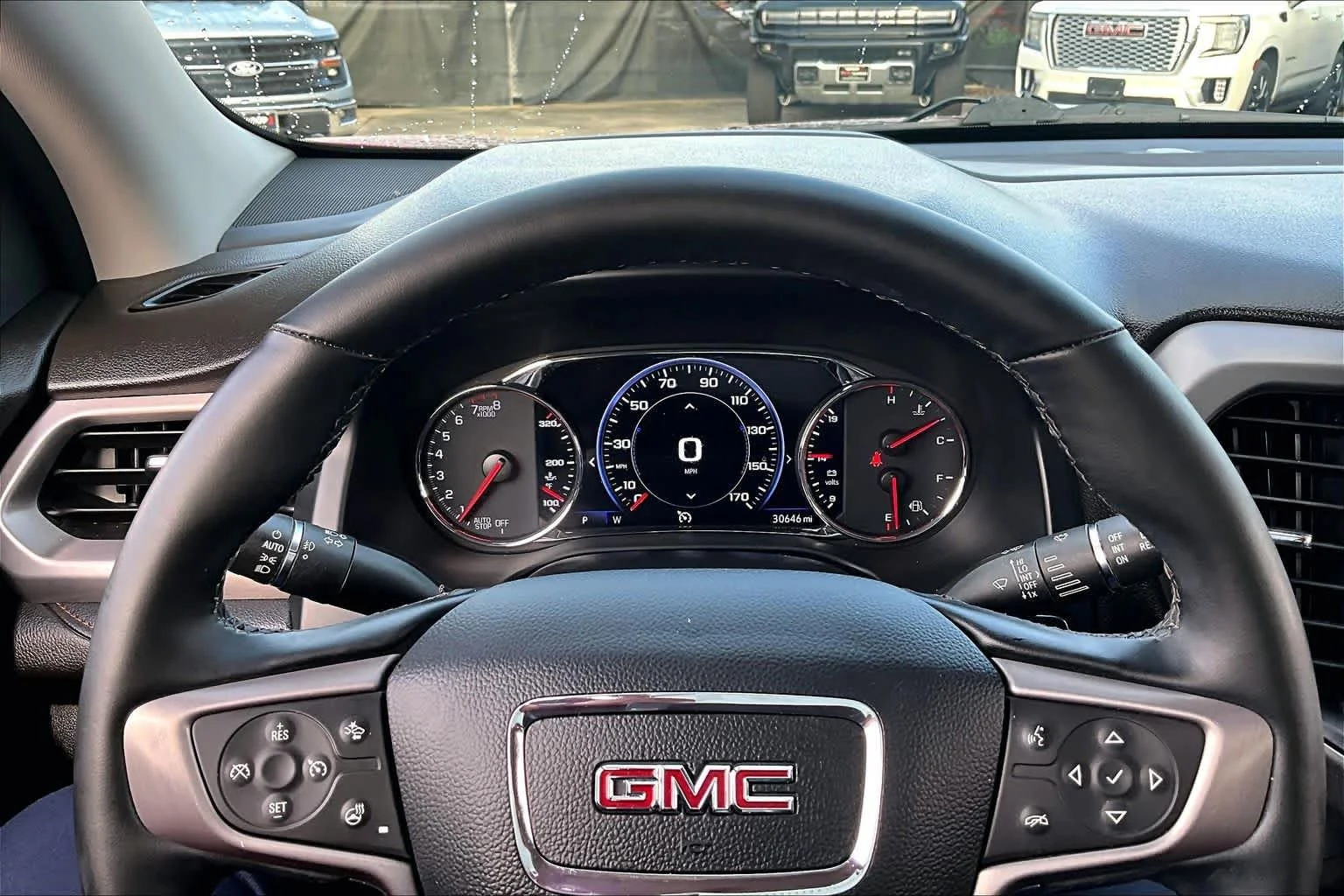 Used 2023 VOLCANIC RED TINCOAT GMC AT4 image 50