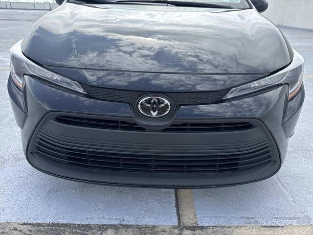 Used 2025 Midnight Black Metallic Toyota LE image 12
