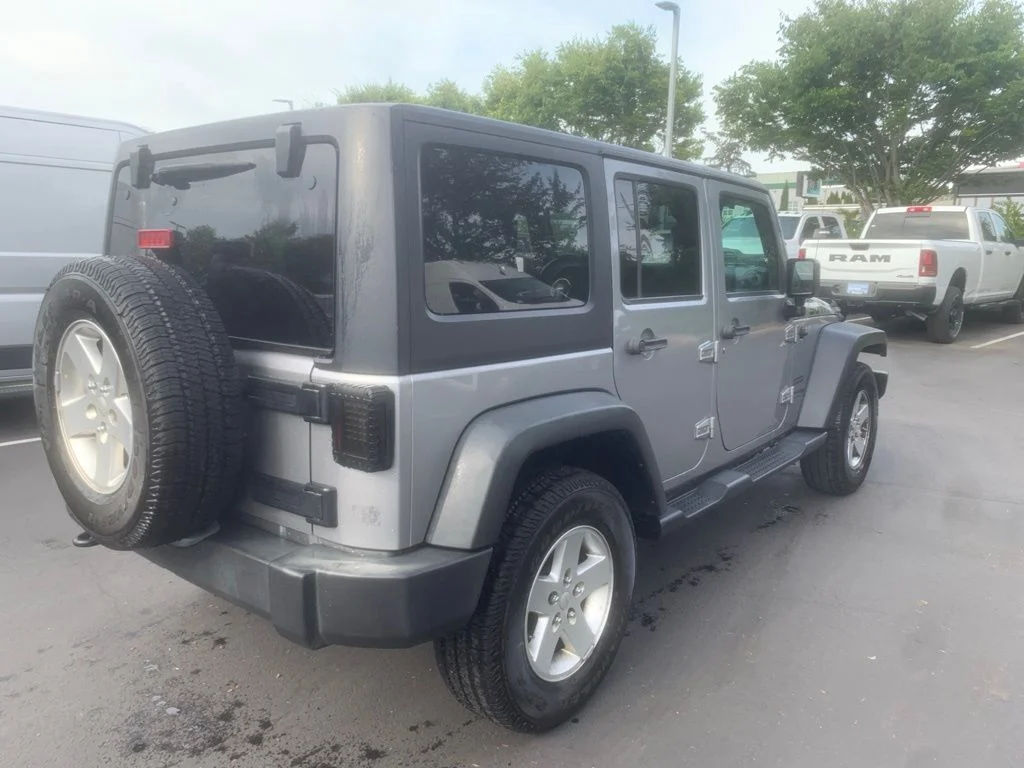 Used 2018 Billet Silver Metallic Clearcoat Jeep Unlimited Sport image 4