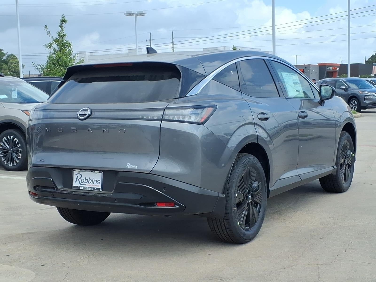 New 2026 Gun Metallic Nissan SV image 5