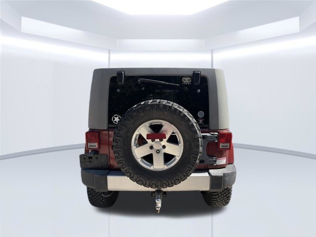 Used 2010 Red Jeep Unlimited Sahara image 7
