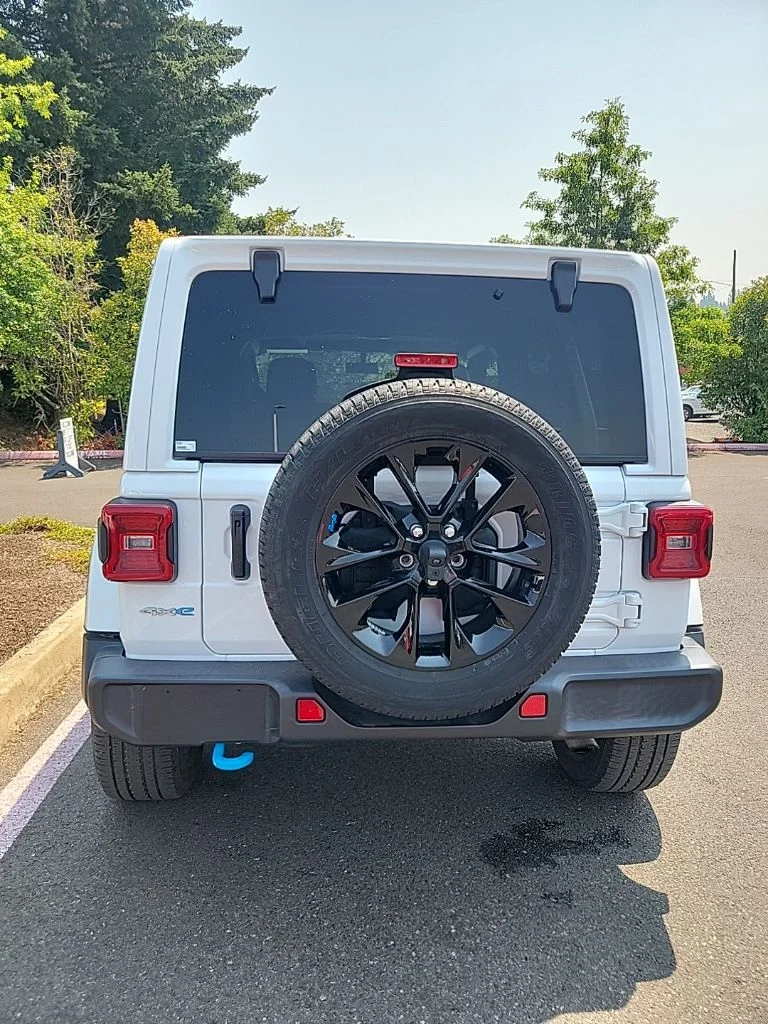 Used 2023 Bright White Clearcoat Jeep Sahara 4xe image 4