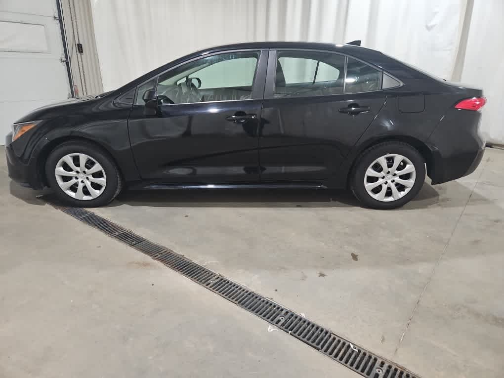 Used 2024 Midnight Black Metallic Toyota LE image 4