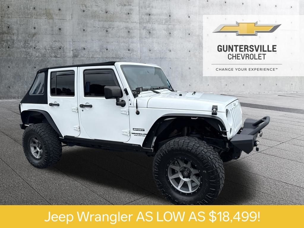 Used 2016 White Jeep Unlimited Sport image 1