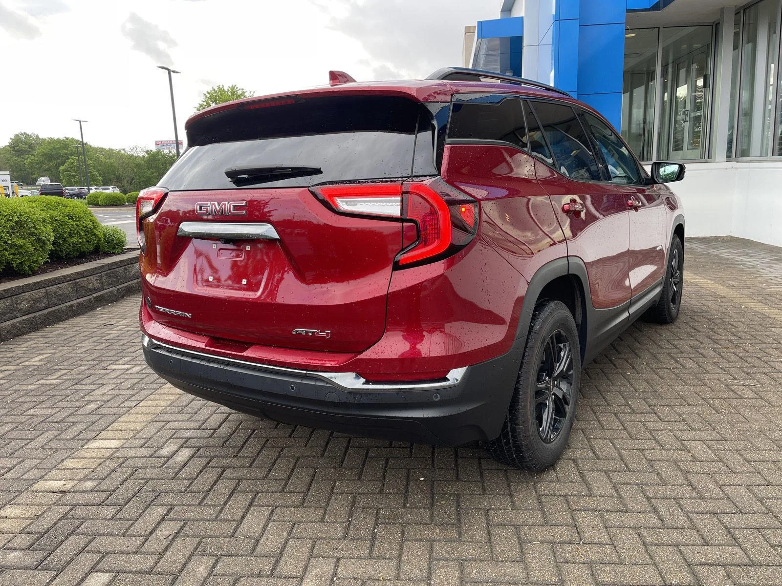 Used 2024 Volcanic Red Tintcoat GMC AT4 image 5
