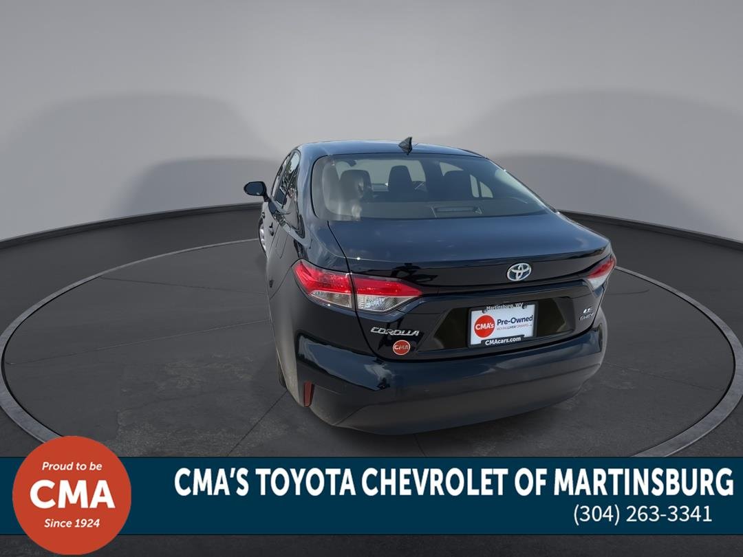 Used 2025 Midnight Black Metallic Toyota Hybrid LE image 7