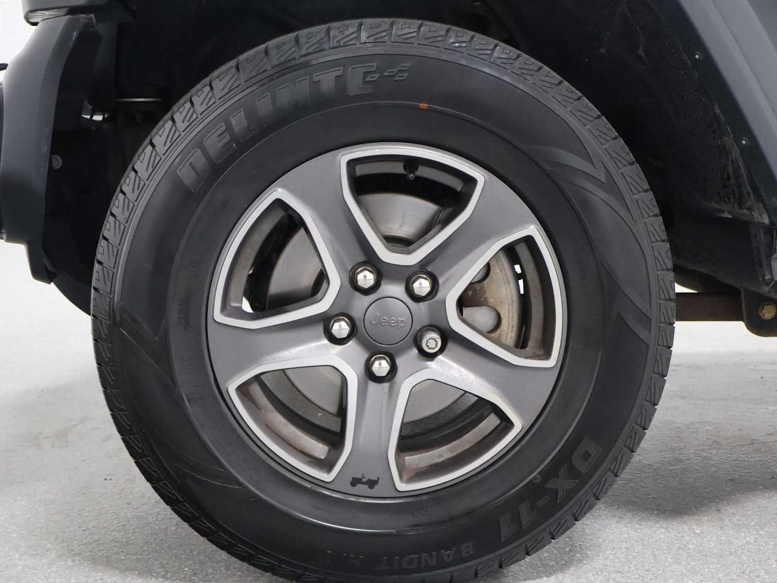 Used 2018 Granite Crystal Metallic Clearcoat Jeep Sport S image 34