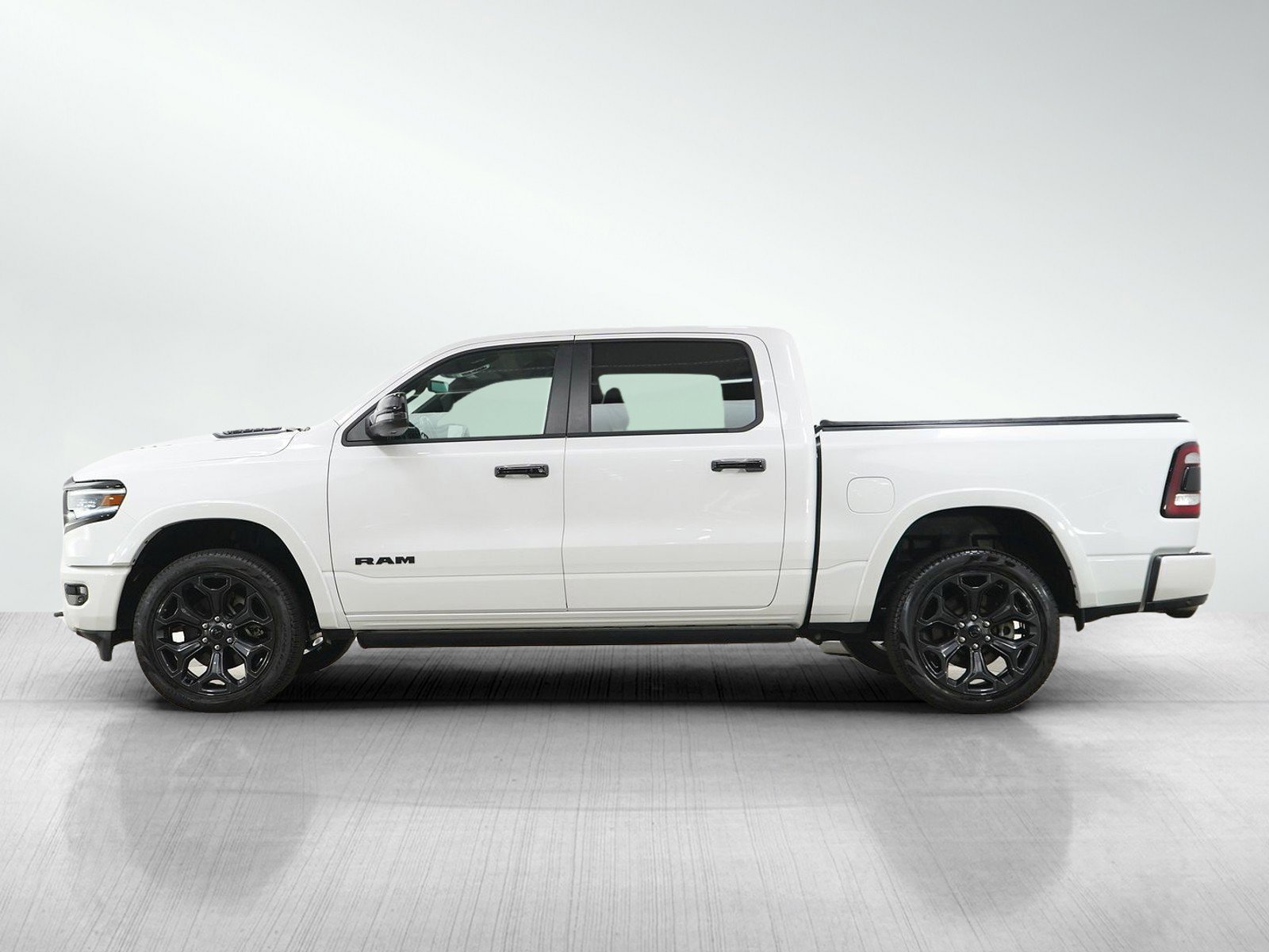 Used 2023 RAM Ram 1500 Limited with VIN 1C6SRFHT6PN641366 for sale in Hopkins, Minnesota