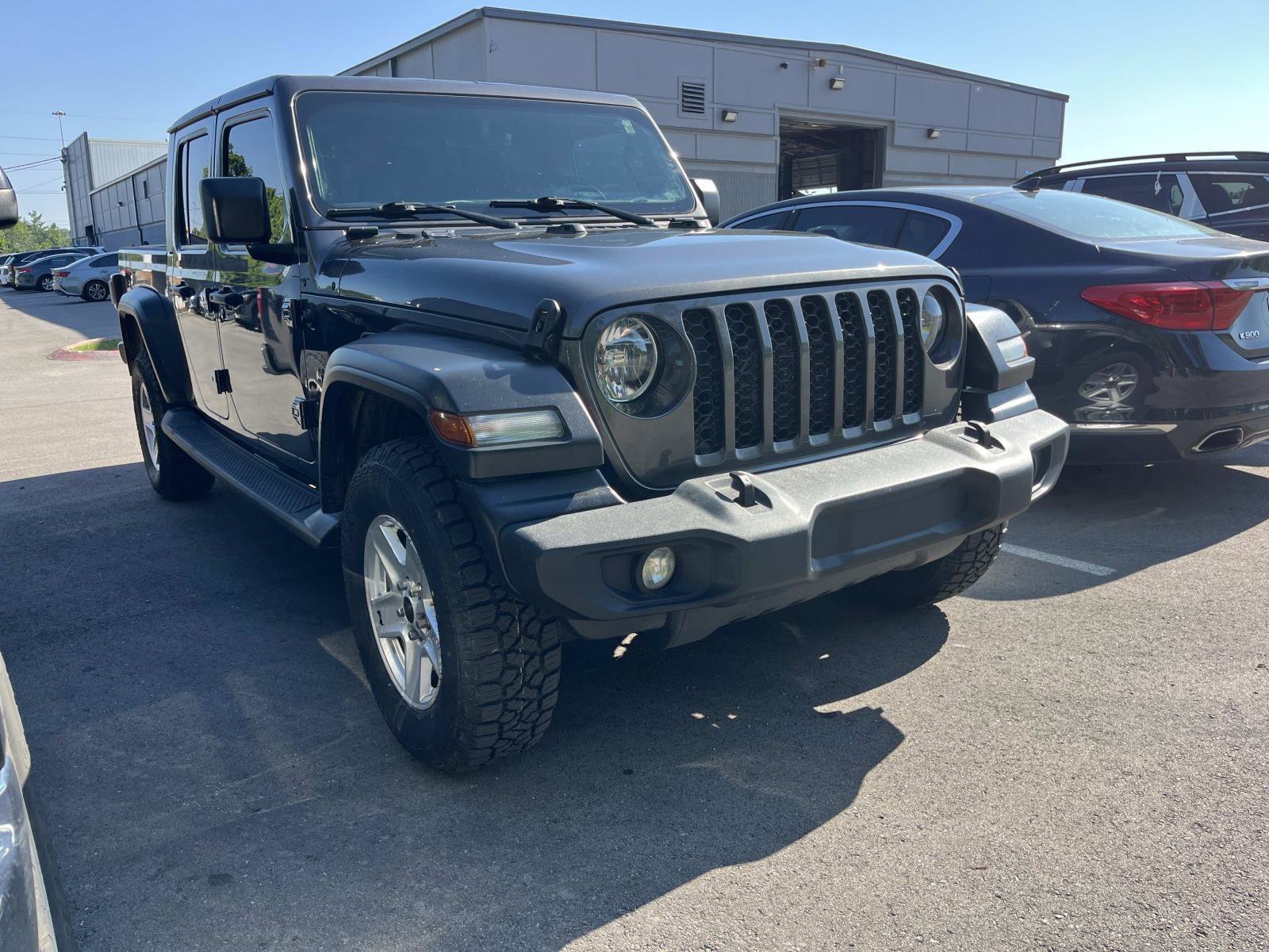 Used 2020 Granite Crystal Metallic Clearcoat Jeep Sport S image 1