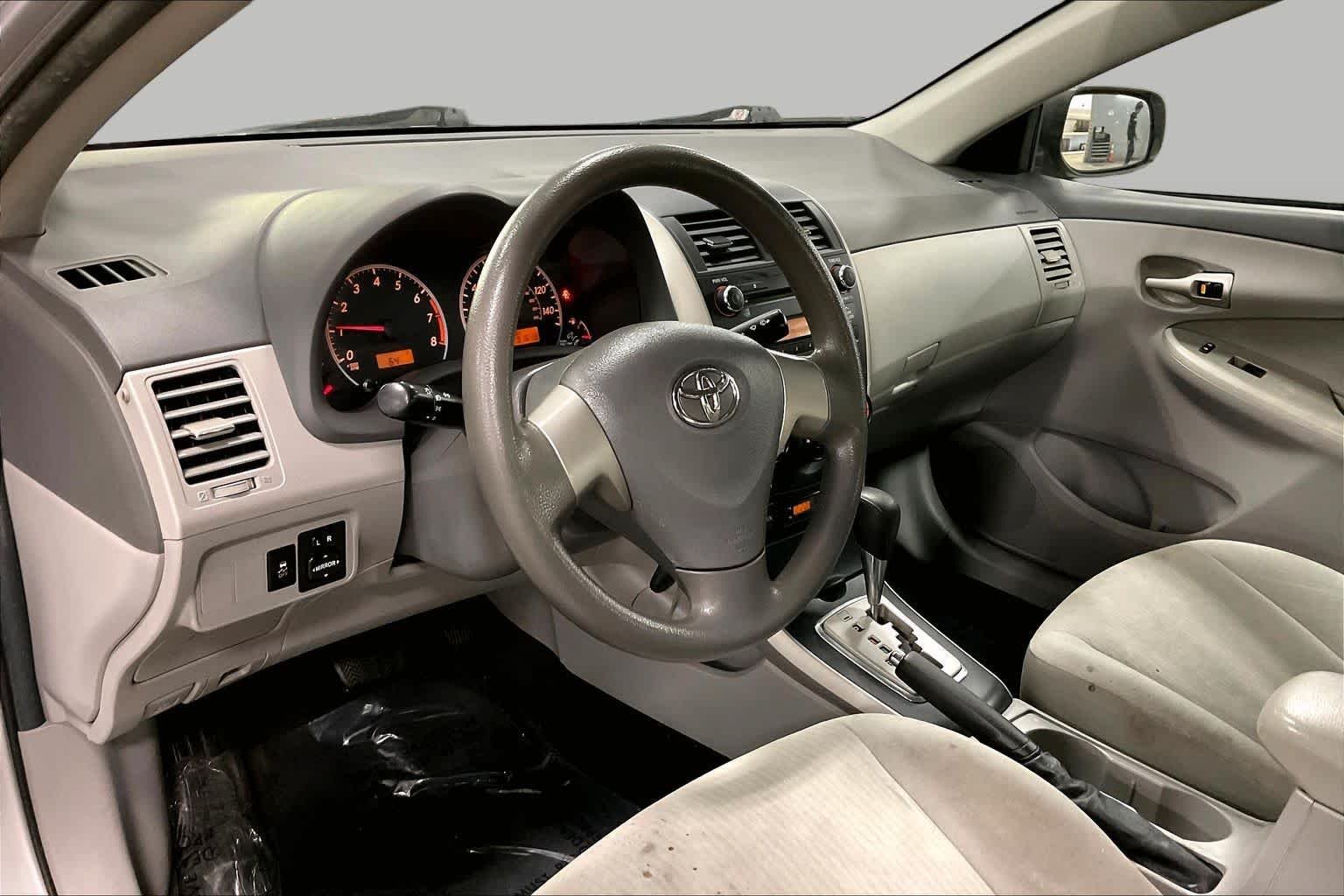 Used 2010 Classic Silver Metallic Toyota LE image 16