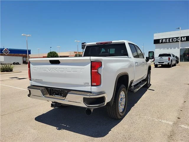 Used 2025 Summit White Chevrolet LTZ 4x4 Crew Cab 8 ft. box 172 in. WB image 4