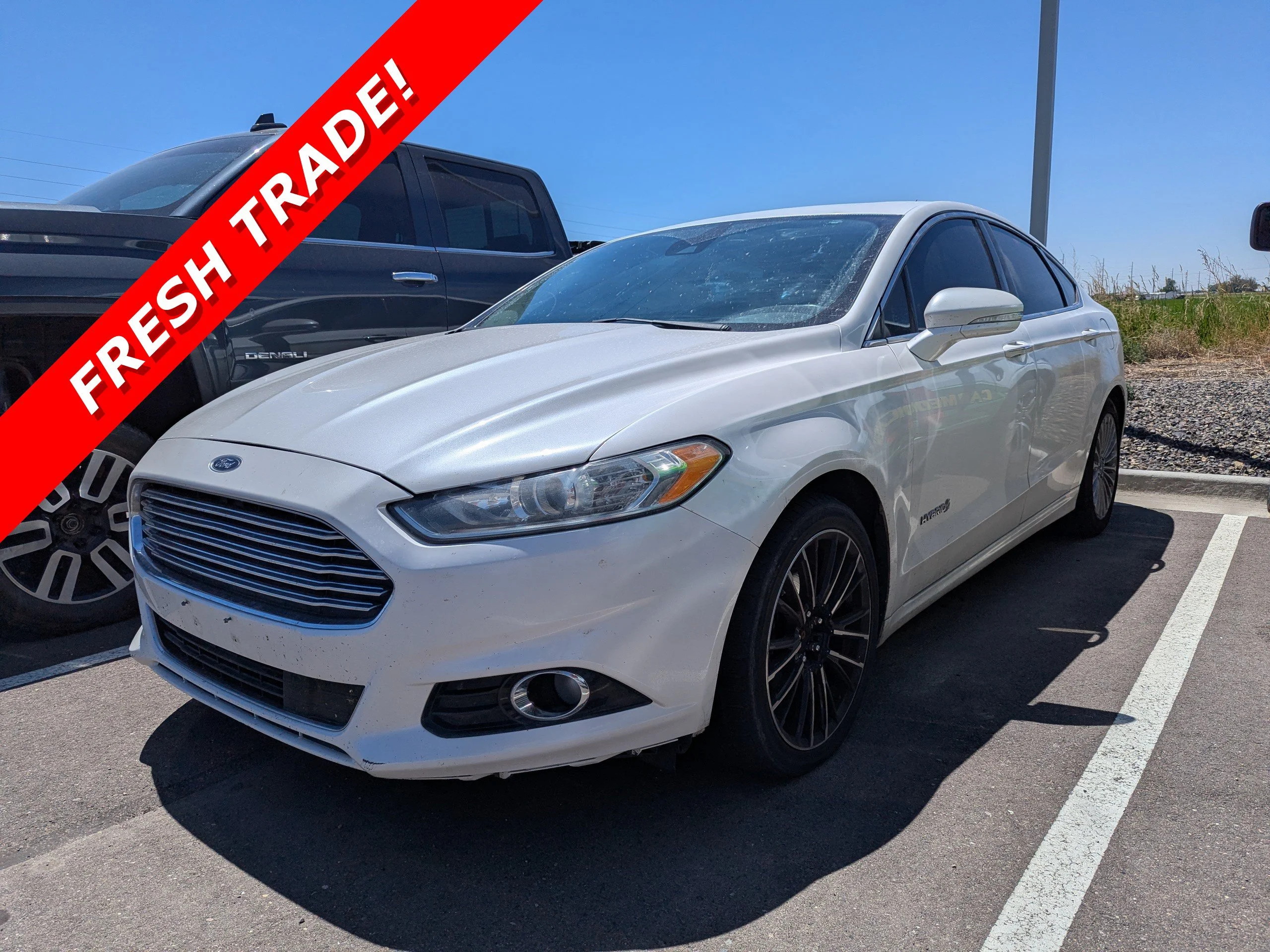 Used 2014 White Ford Titanium Hybrid image 1