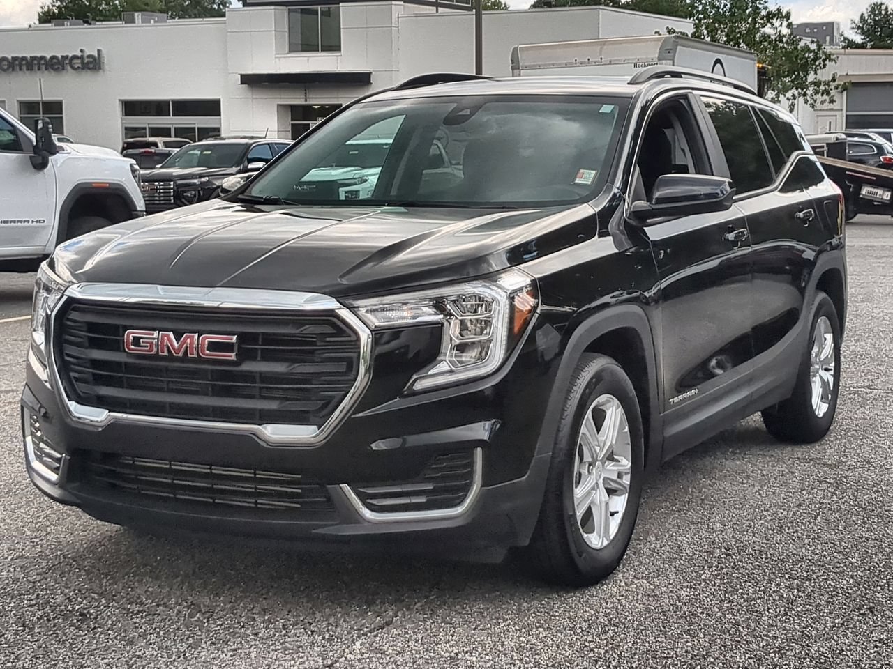 Used 2023 Ebony Twilight Metallic GMC SLE image 4