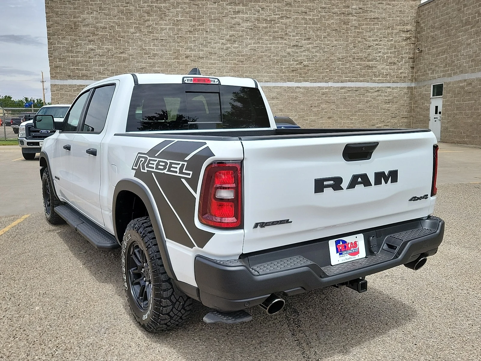 New 2026 PW7 Bright Whit Ram REBEL CREW CAB 4X4 5