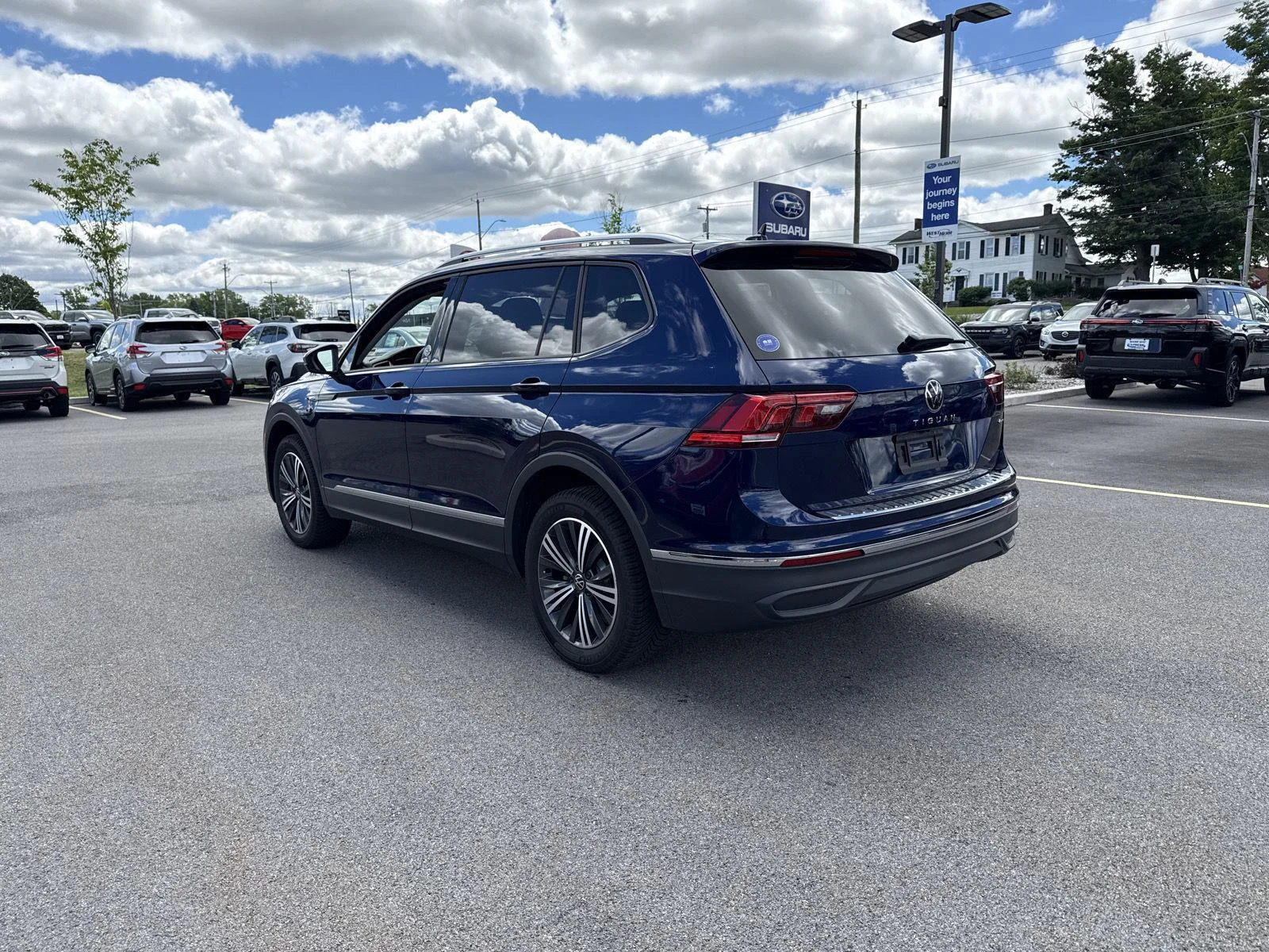 Used 2024 Atlantic Blue Metallic Volkswagen SE image 5