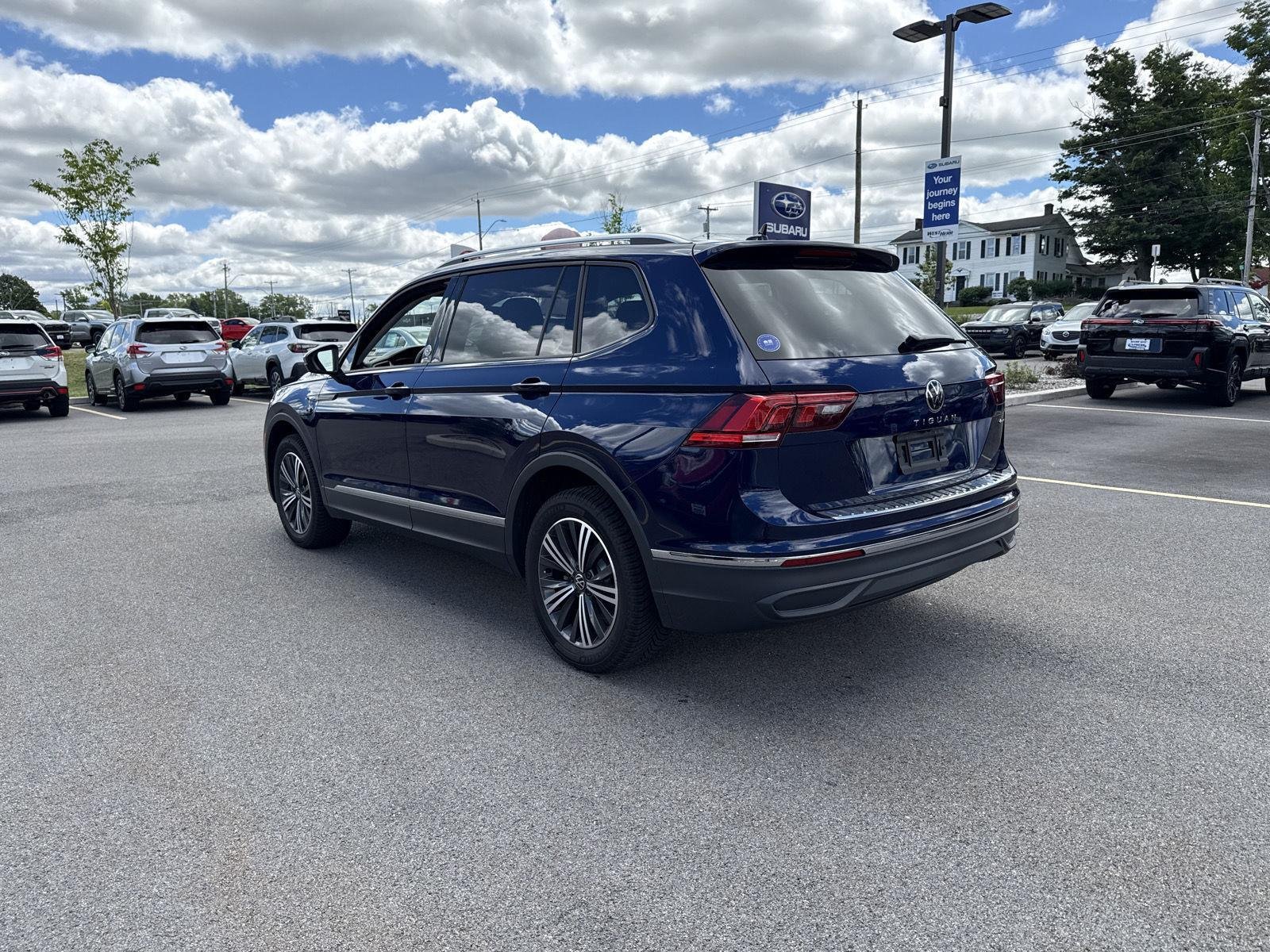 Used 2024 Atlantic Blue Metallic Volkswagen SE image 5