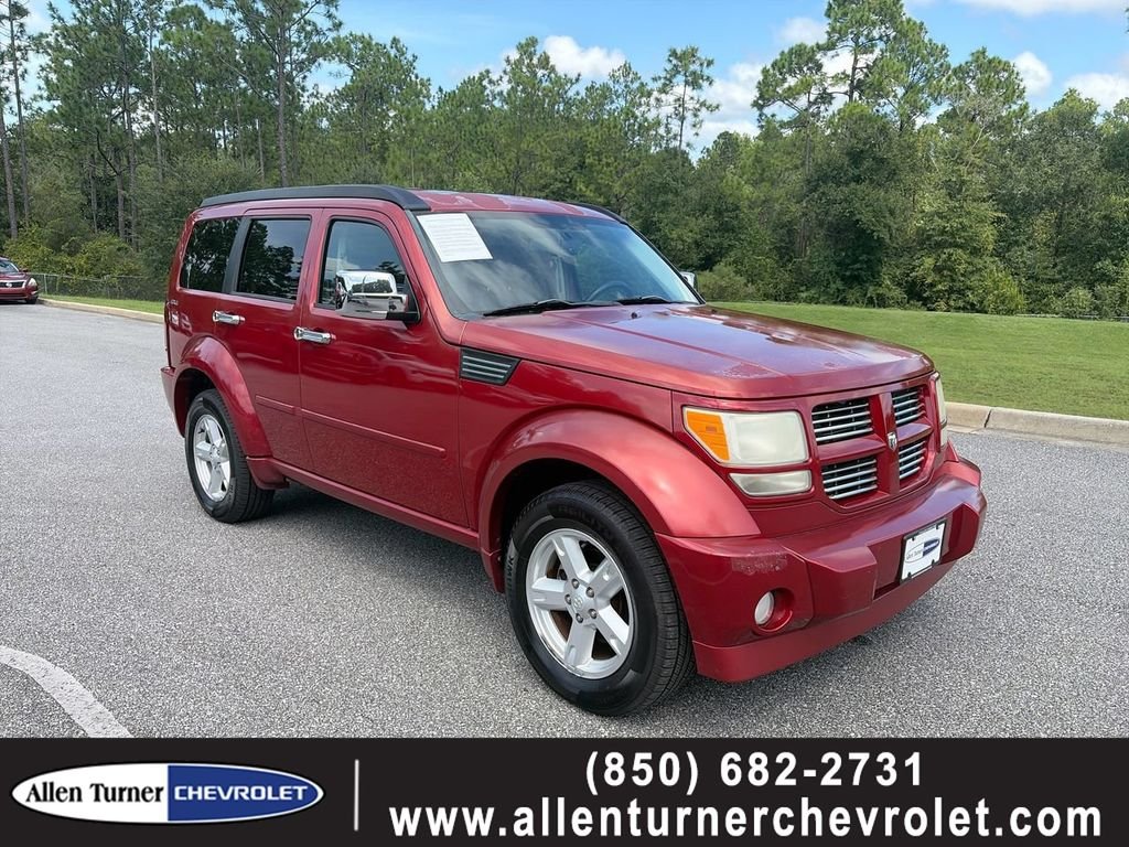 Used 2010 Red Dodge SXT image 1