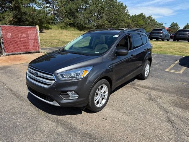 Used 2018 Magnetic Metallic Ford SEL image 1