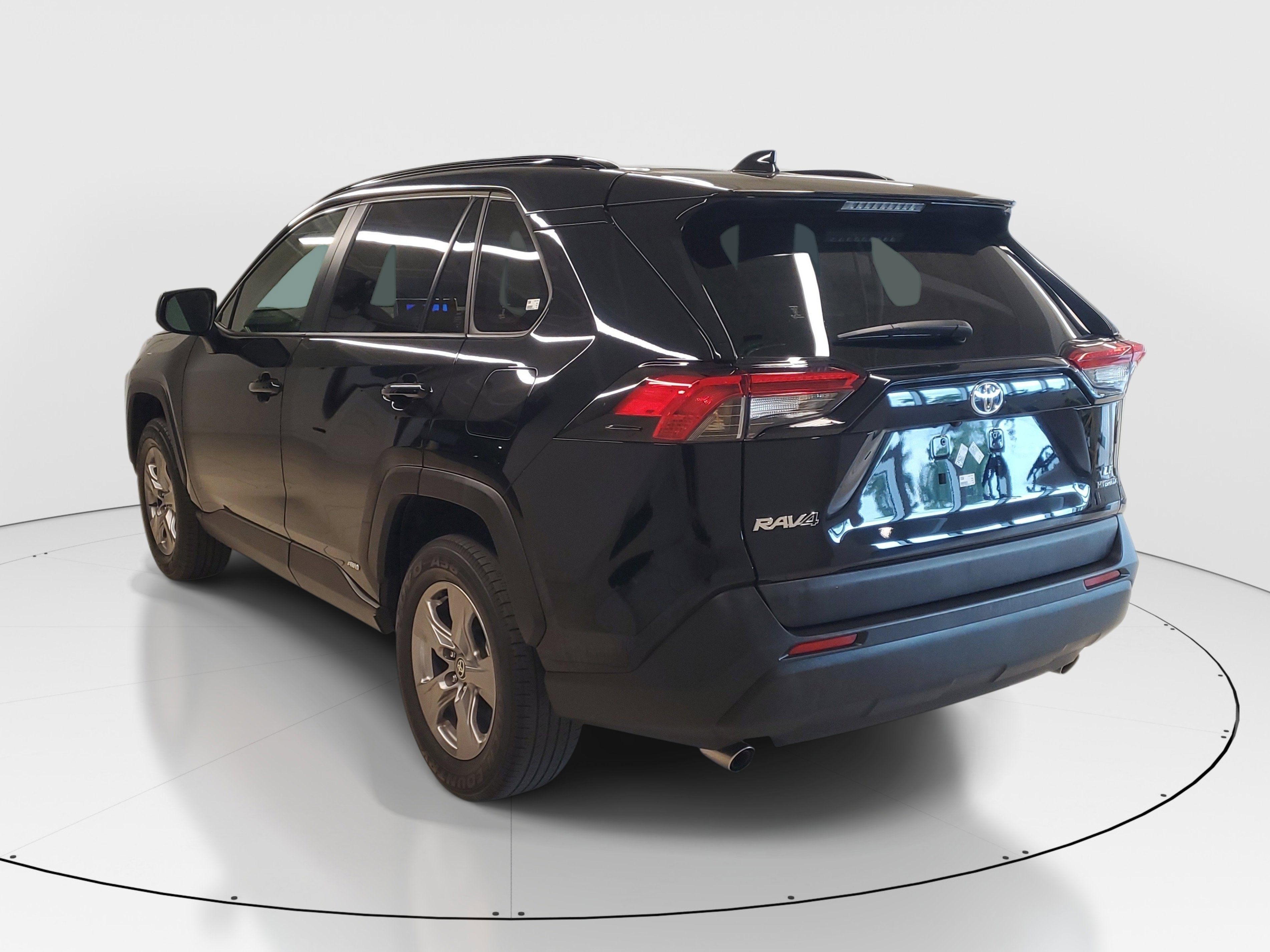 Used 2024 Midnight Black Metallic Toyota Hybrid LE image 5