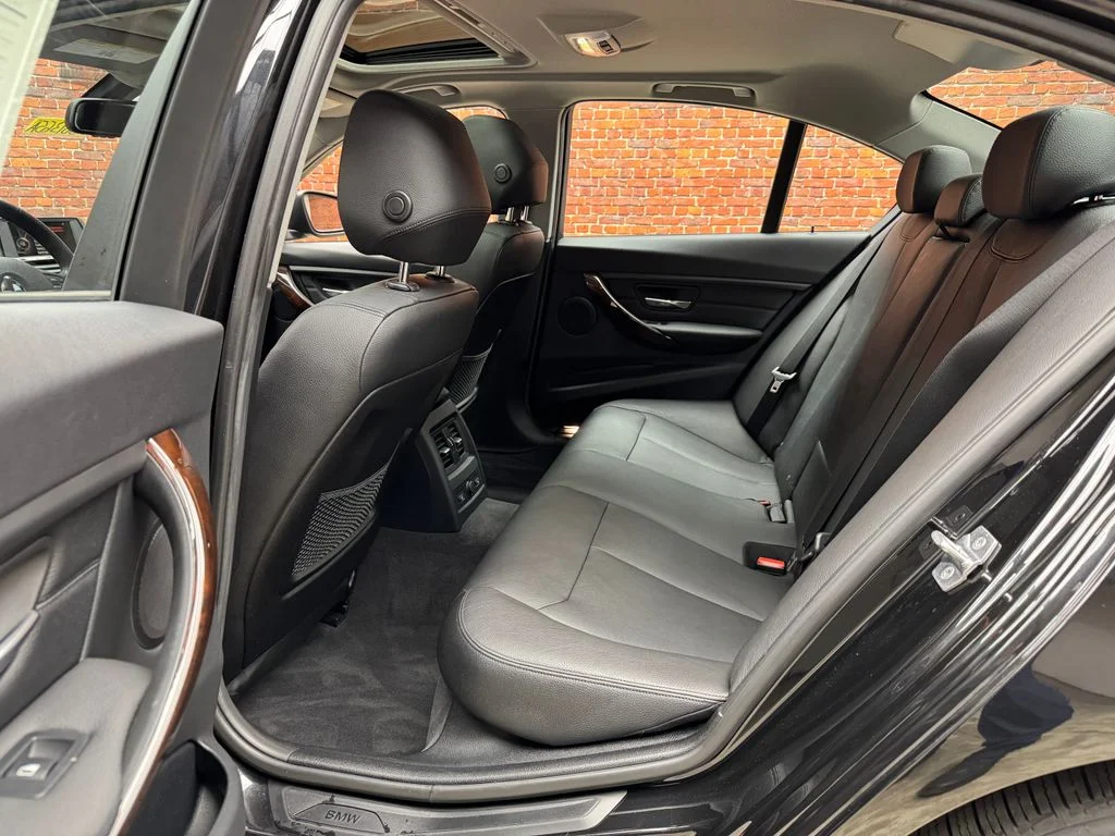 Used 2015 Black BMW 320i xDrive image 25