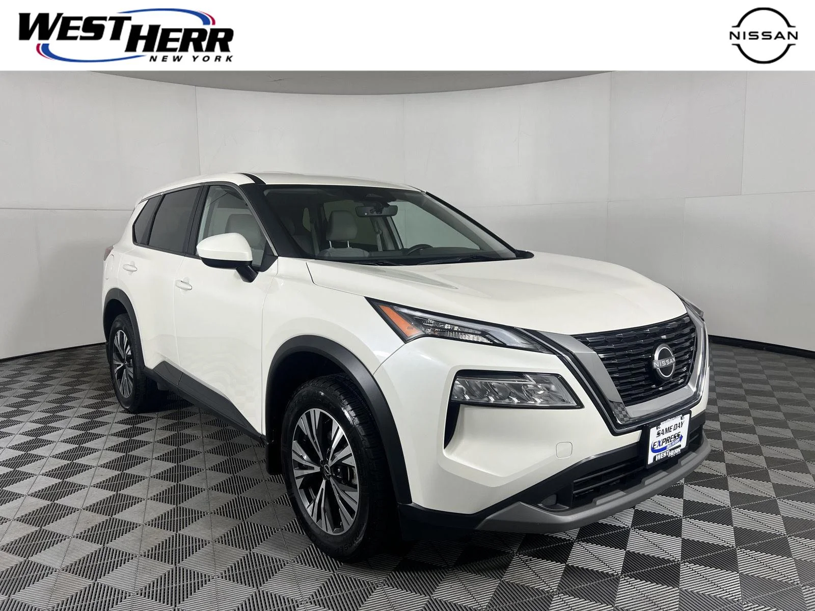 Used 2023 Pearl White Tricoat Nissan SV image 1
