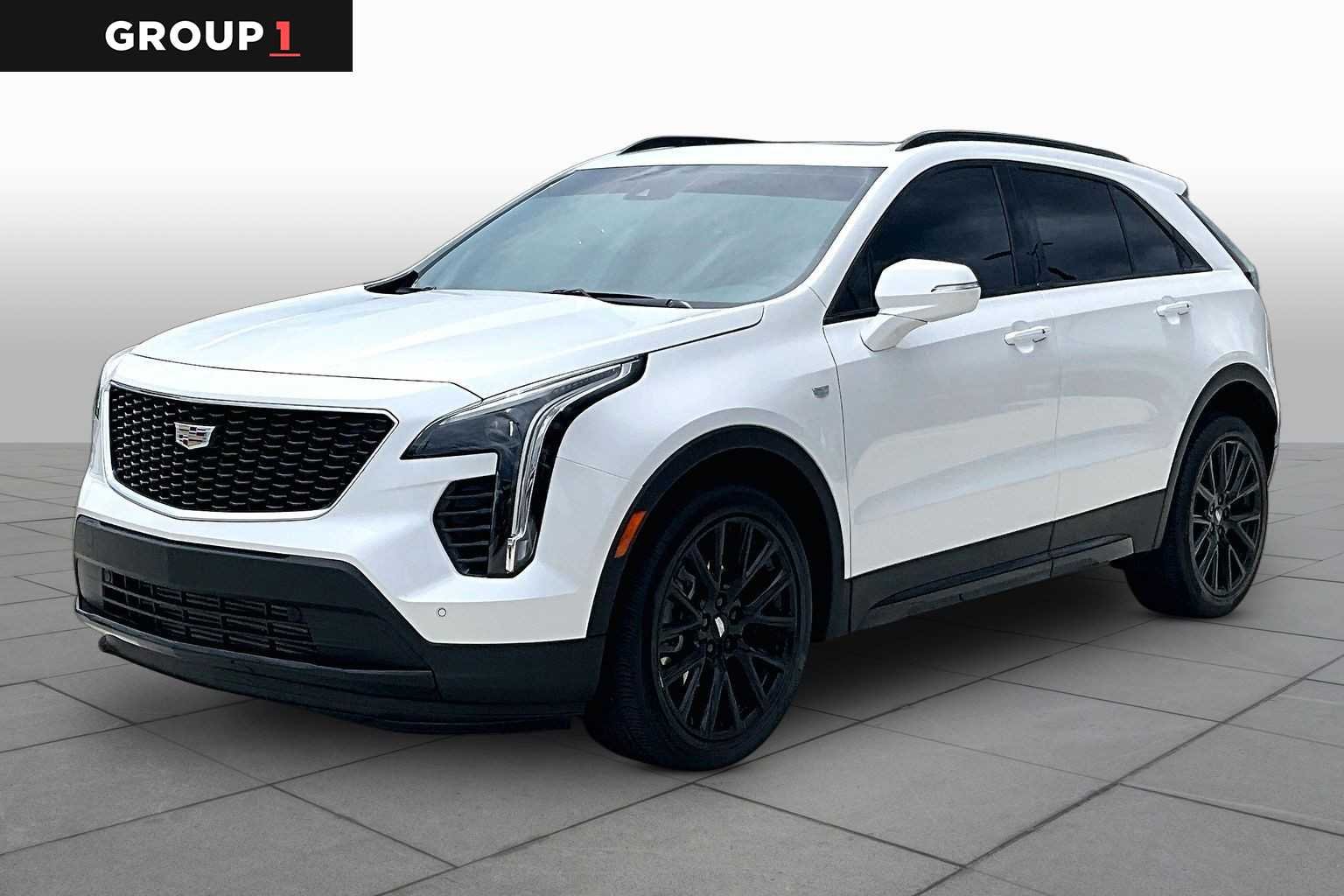 Used 2023 Crystal White Tricoat Cadillac FWD Sport image 1
