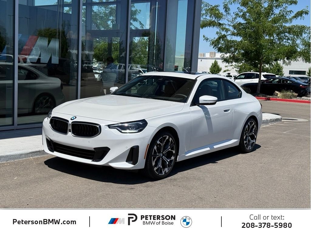 Certified Used 2025 Mineral White Metallic BMW 230i xDrive image 1