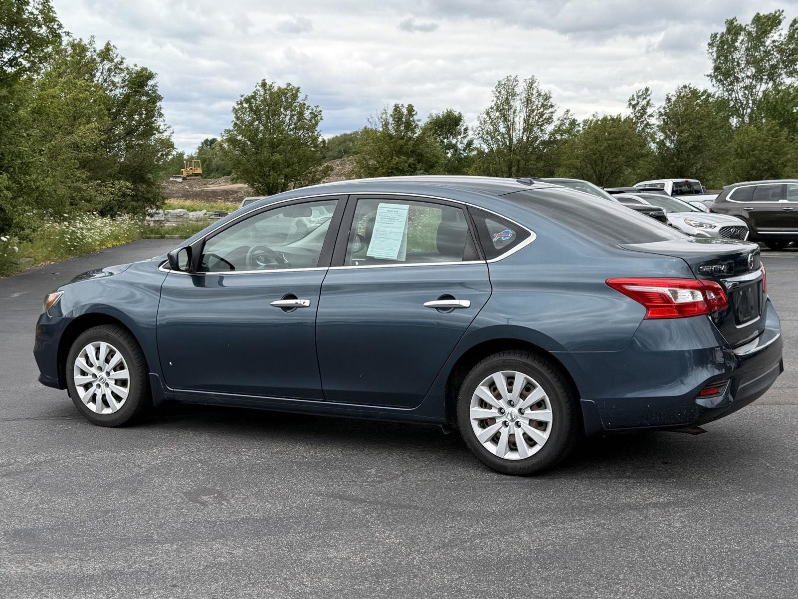 Used 2016 Graphite Blue Metallic Nissan SV image 4