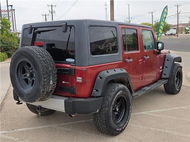 Used 2011 Red Jeep Sahara 4x4 image 4