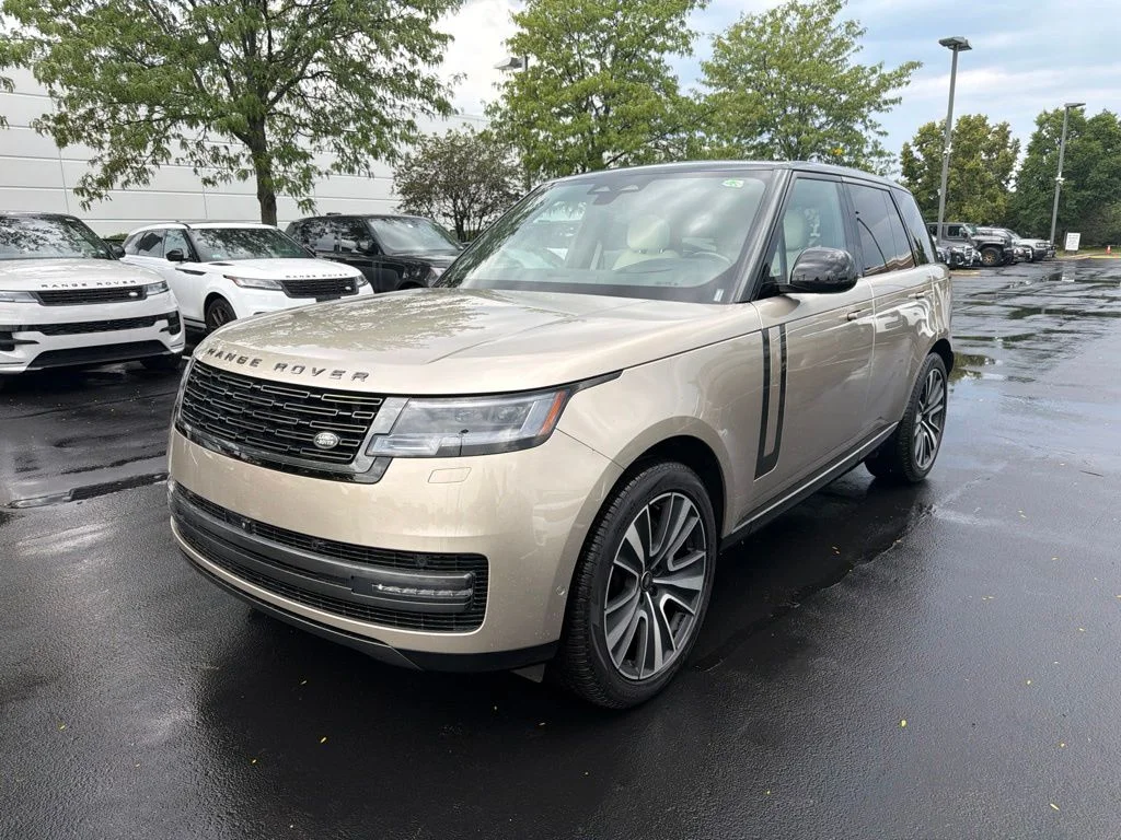 Used 2025 Batumi Gold Premium Metallic Land Rover SE image 1