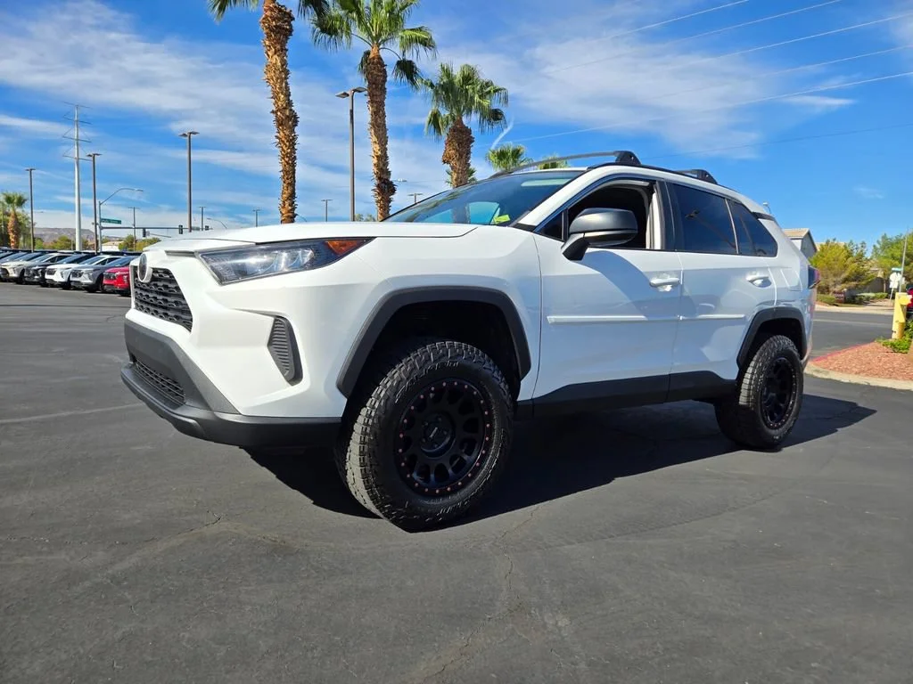 Used 2021 Super White Toyota LE image 2