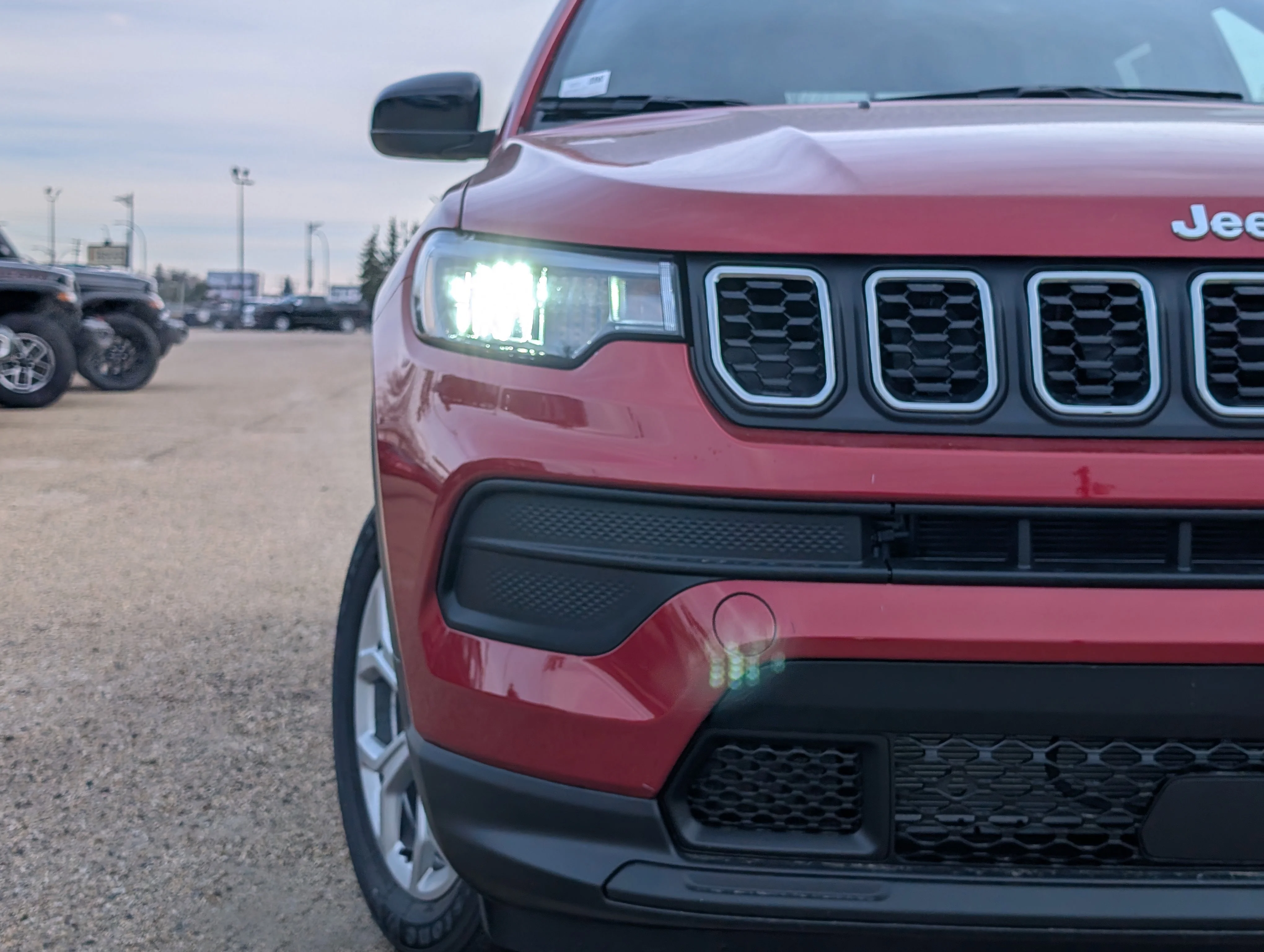 New 2026 Red Hot Pearl Jeep Sport image 11