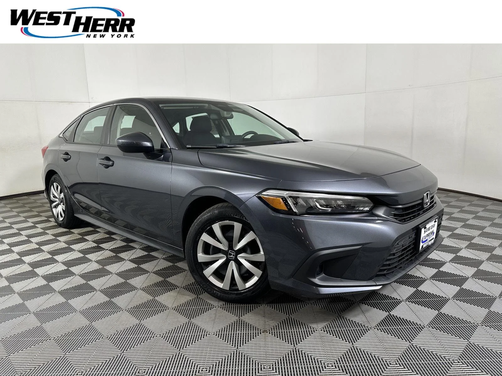 Used 2023 Meteorite Gray Metallic Honda LX image 1