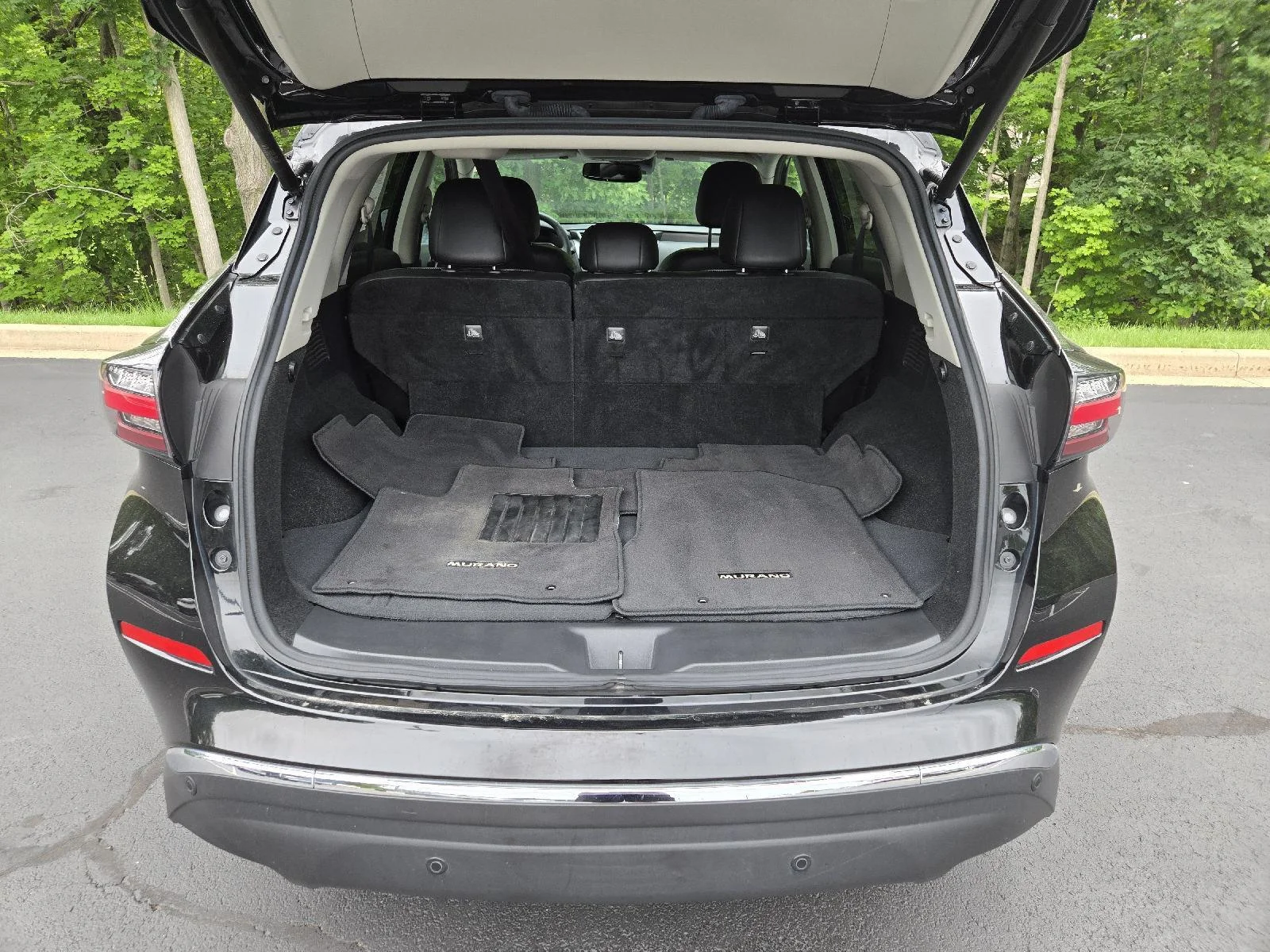 Used 2019 Magnetic Black Pearl Nissan Platinum image 9