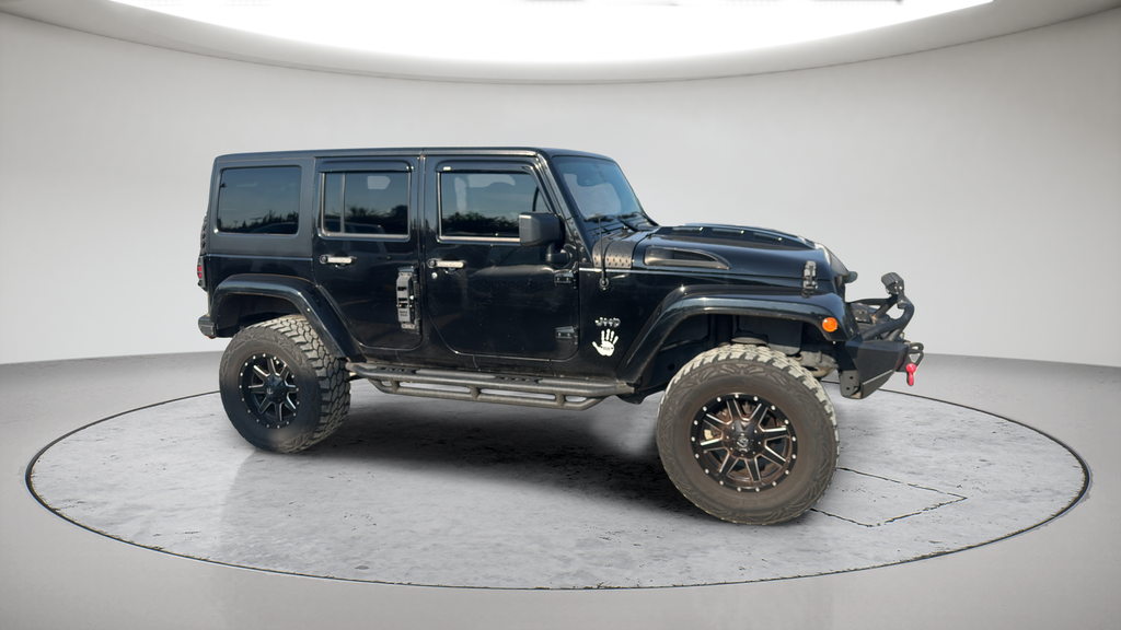 Used 2015 Black Jeep Unlimited Sahara image 3