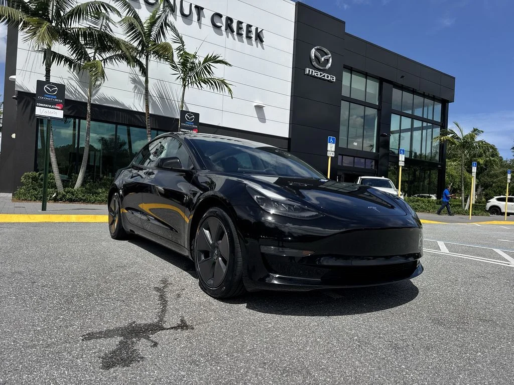 Used 2023 Solid Black Tesla  image 30