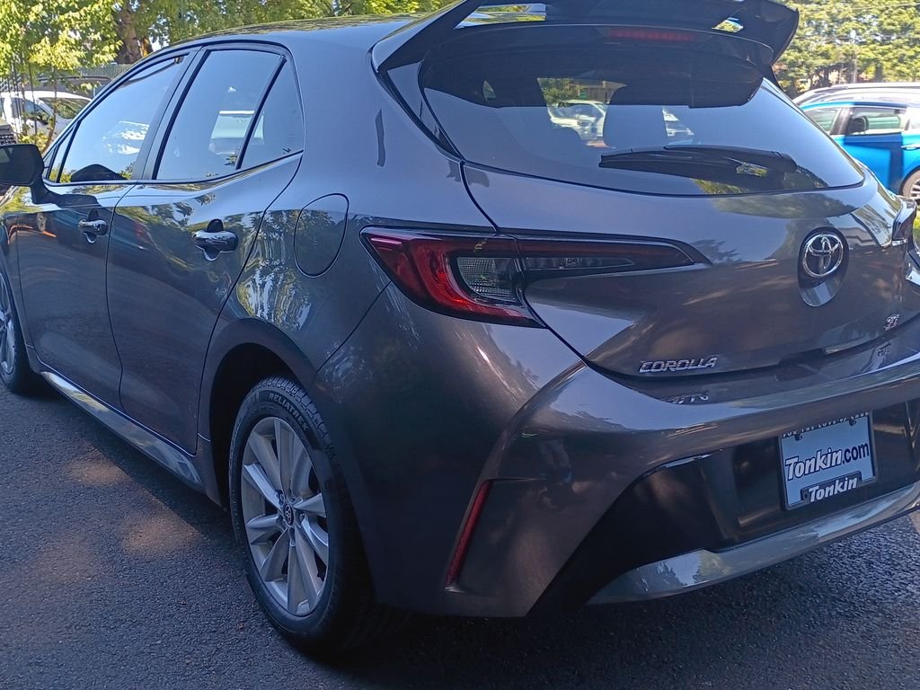 Used 2023 Magnetic Gray Metallic Toyota SE image 6
